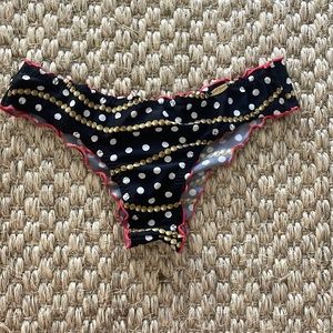 Luli Fama XS bikini bottoms rouge butt